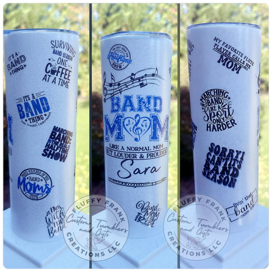 Three white tumblers with blue text and designs, featuring 'Band Mom' and related phrases.