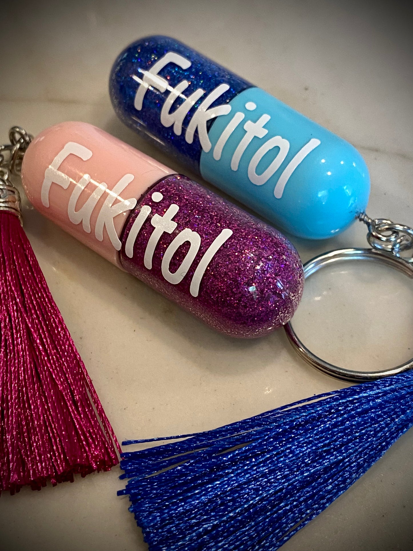 Fukitol capsule keychain