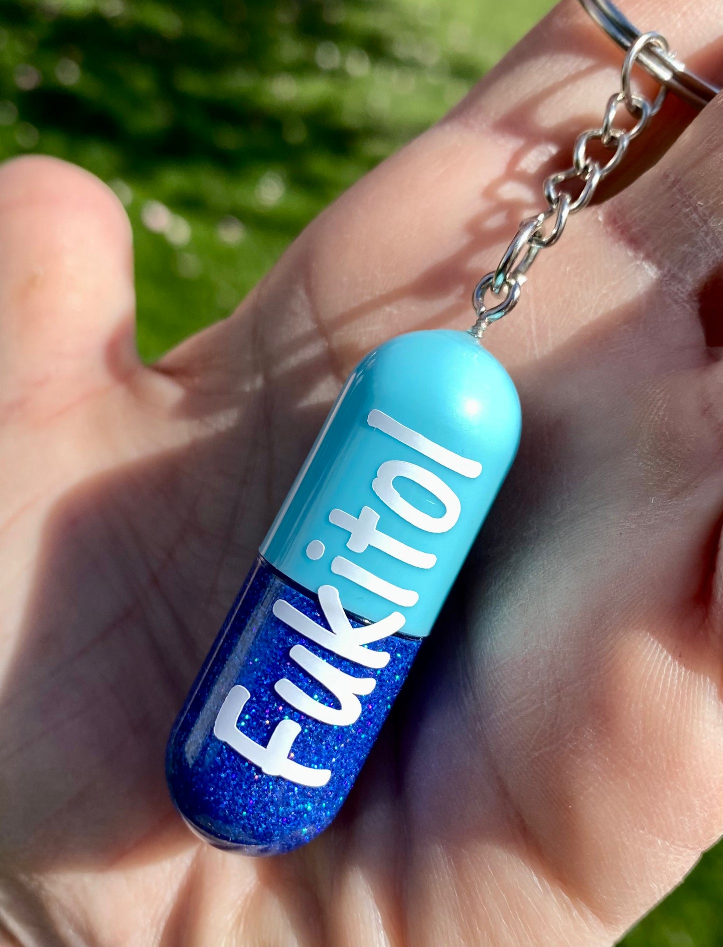 Fukitol capsule keychain
