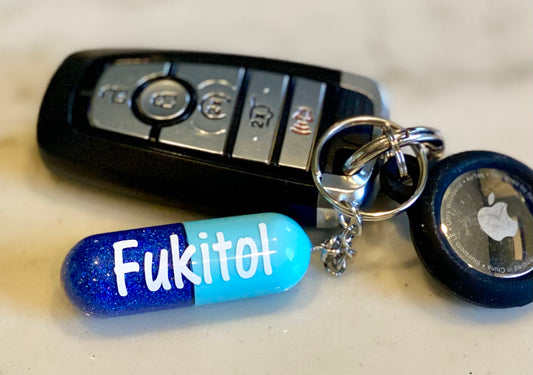 Fukitol capsule keychain