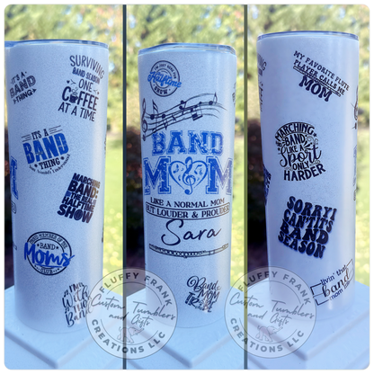 Three white tumblers with blue text and designs, featuring 'Band Mom' and related phrases.
